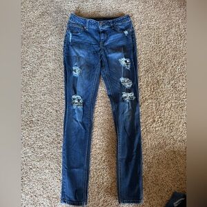 Maurices Blue Skinny Jeans with Distressed Details